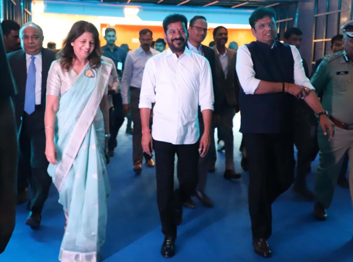 SEEN CHIEF MINISTER MR REVANTH REDDY SEEN ARRIVING AT TH SHIELD 20254. ALSO SEEN ARE SHRI D SRIDHAR BABU _ MS SHIKHA GOEL AND OTHER POLICE OFFICER