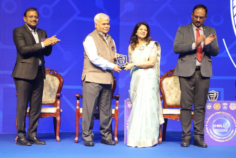 SEEN MS SHIKHA GOEL PRESENTING A MEMENTO TO DR RS SHARMA