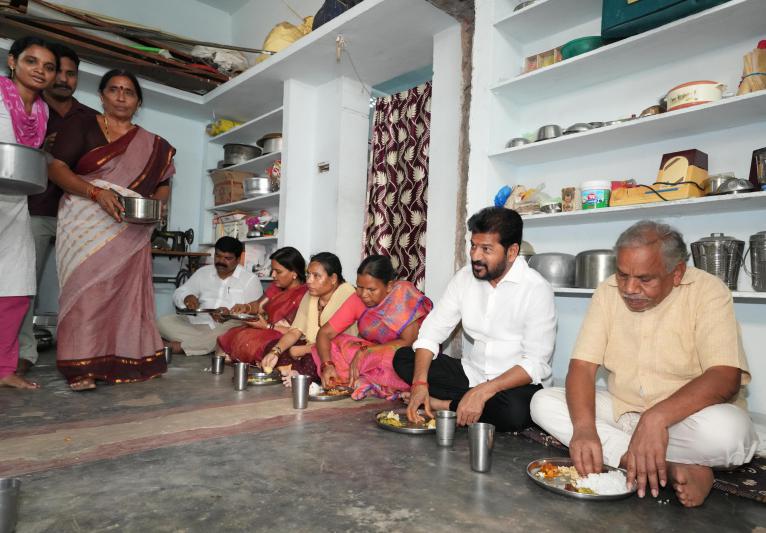 Revanth Reddy Meal with Rice Scheme Beneficiary Family