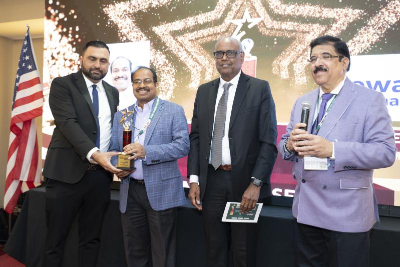 Sridhar Talanki receiving the award