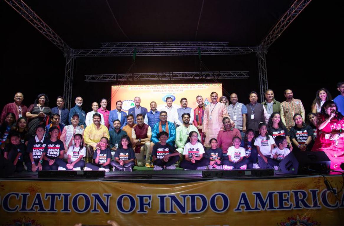 Dignitaries on the stage with participants