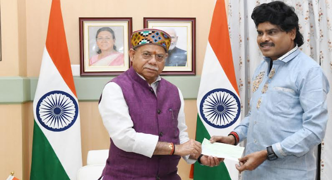 Hero Krishna Sai Presents Rs. 4 Lakh Cheque to Telangana Governor Shiv Pratap Shukla