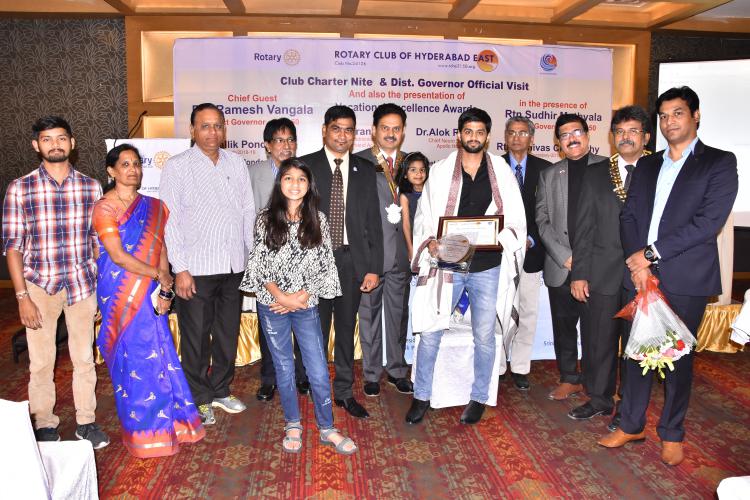 Mr-Sai-Praneeth-Intl-Badminton-Player-receiving-Award.jpg