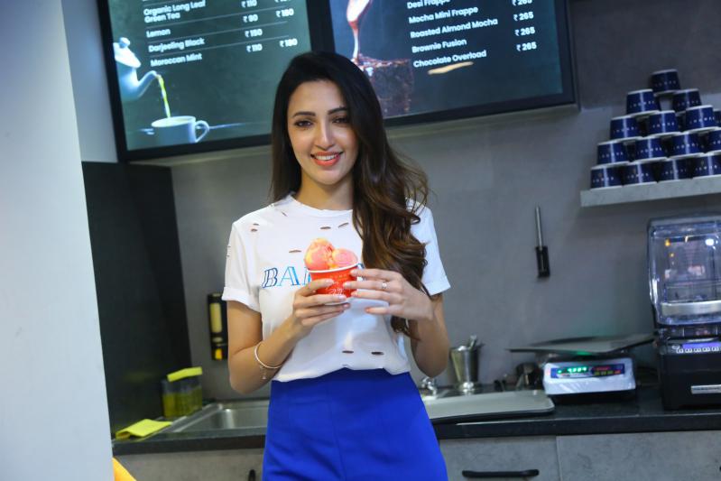 actress-neha-shetty-launches-dumont-coffee-meets-ice-creamery-store-in-kompally-18.jpg