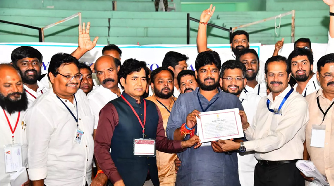Congress Candidate K Naveen Yadav Receives An Election Certificate