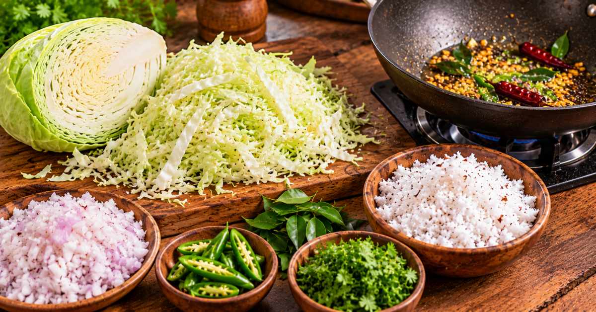 Prepare the cabbage and coconut, and then temper the dish.