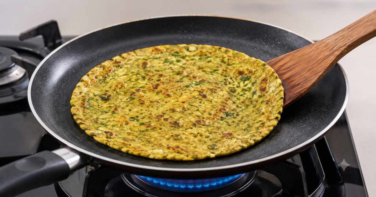 This is how you cook the moong dal flatbread on the griddle.