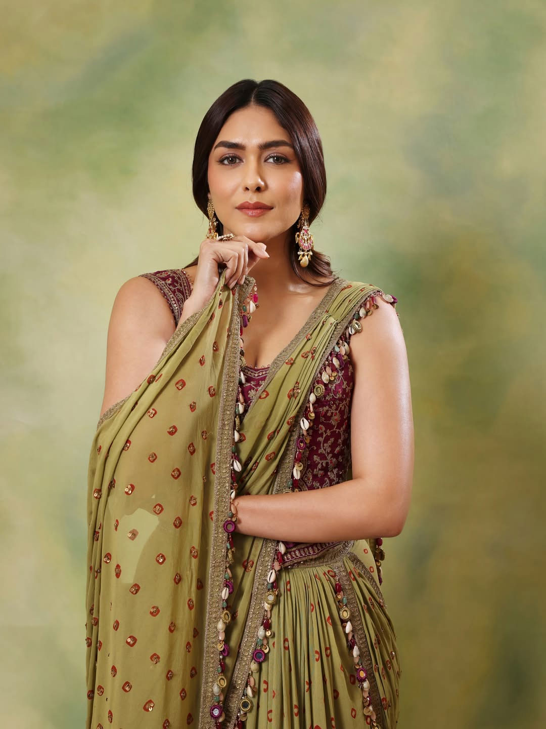 Actress Mrunal Thakur Captivates Fans In An Olive Green Traditional Saree With A Modern Touch