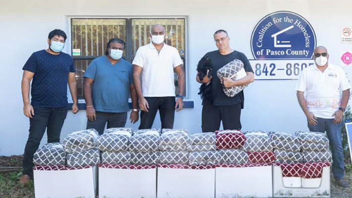 నిరాశ్రయులకు దుప్పట్లు పంపిణీ చేసిన నాట్స్