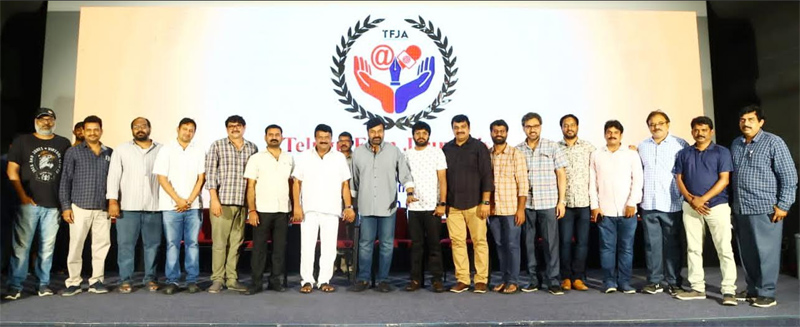 Chiranjeevi Distributes Insurance Cards to Film Journalists