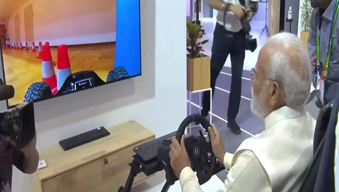 ఢిల్లీ లో ఉండి స్వీడన్ లో కారు నడిపిన మోదీ