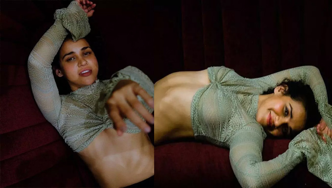 గ్రీన్ టాప్‌లో ఐషా శ‌ర్మ ఇన్న‌ర్ అందాలు