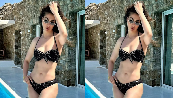 బ్లాక్ బికినీలో అందాలు ఆర‌బోస్తున్న ల‌క్ష్మి రాయ్