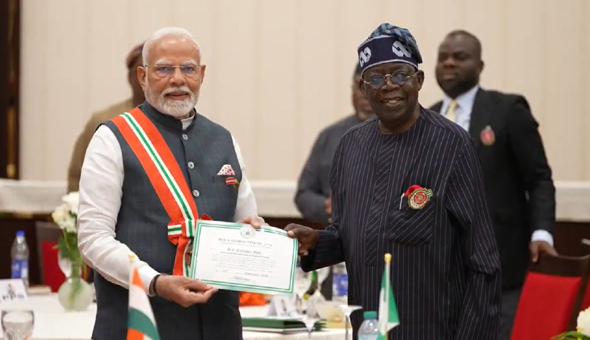 మోదీకి నైజీరియా రెండో అత్యున్నత పురస్కారం ప్రధానం మోదీకి నైజీరియా రెండో అత్యున్నత పురస్కారం ప్రధానం